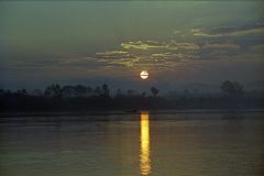 Ondergaande zon boven de Mekong